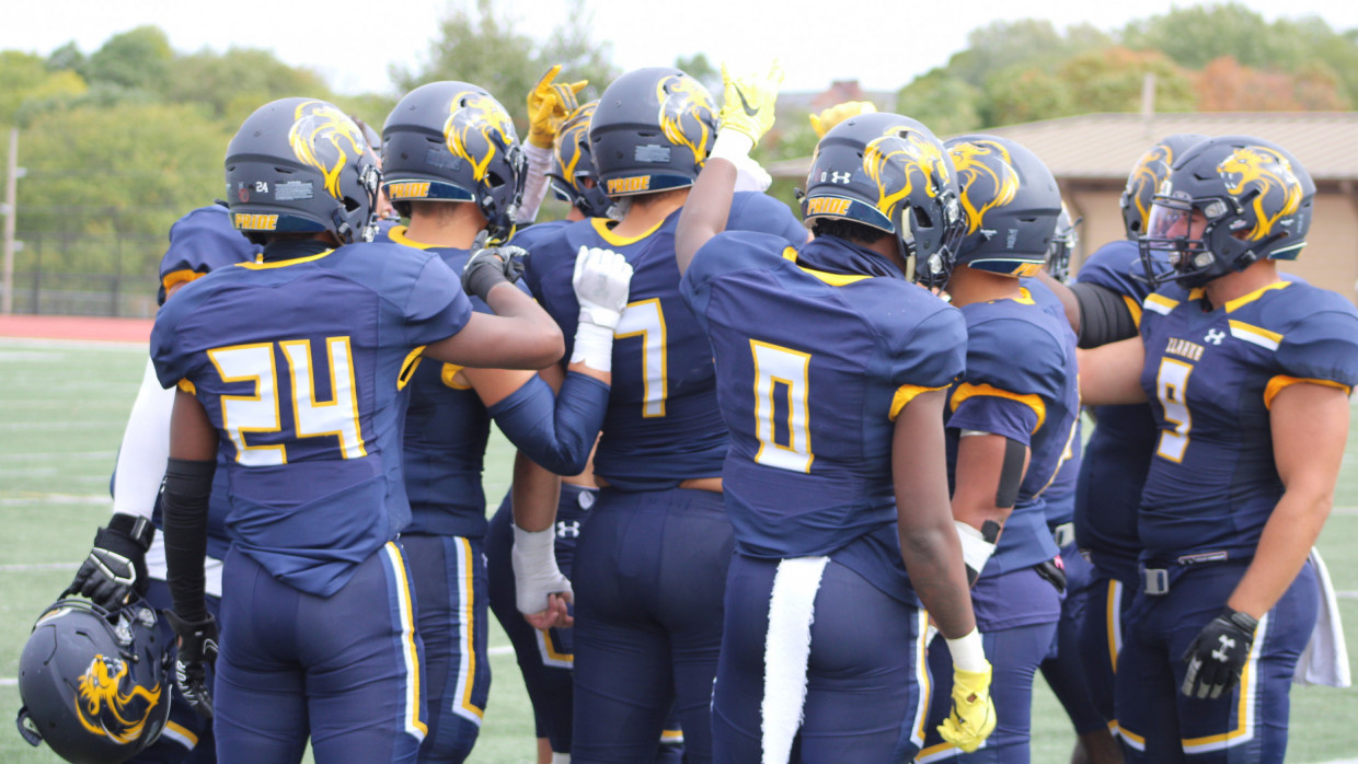 Clarke football's defensive players huddled up