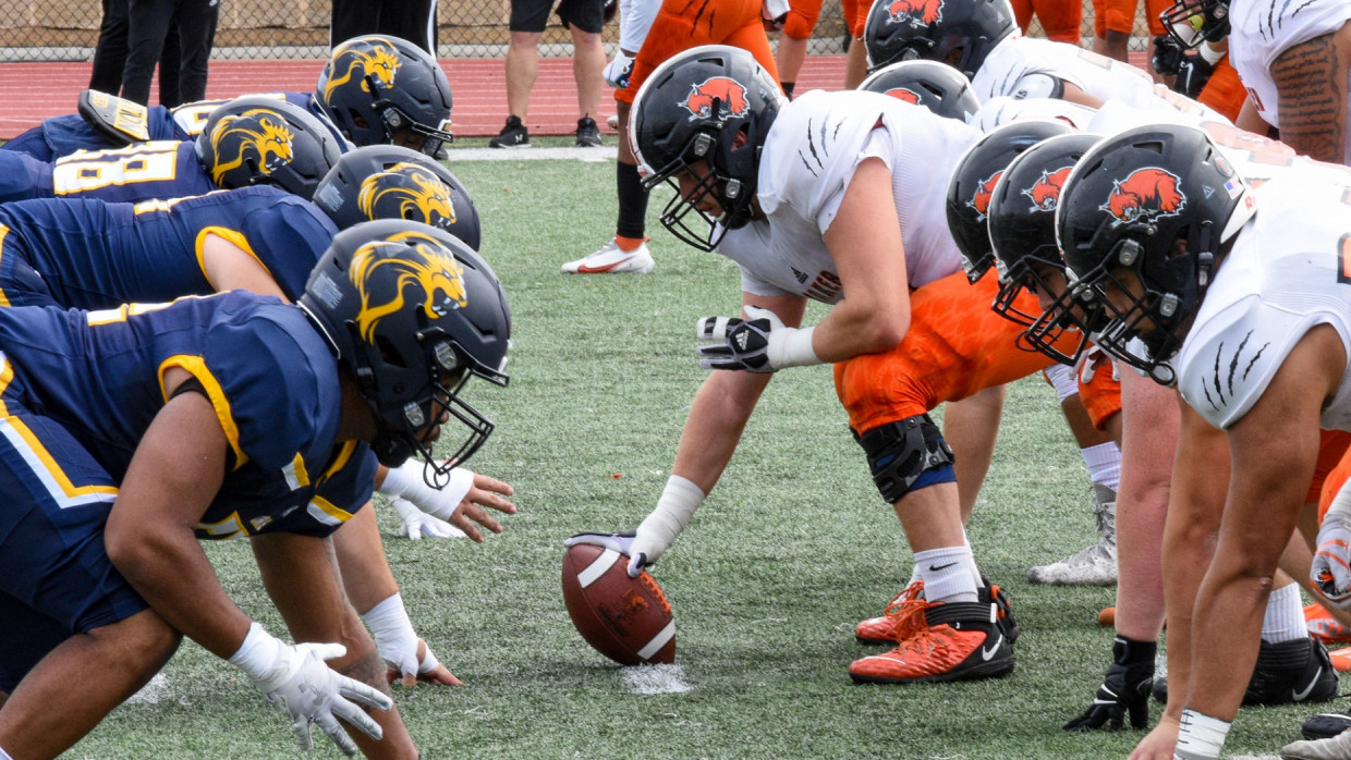 Baker's offensive line lined up against Clarke's defensive line