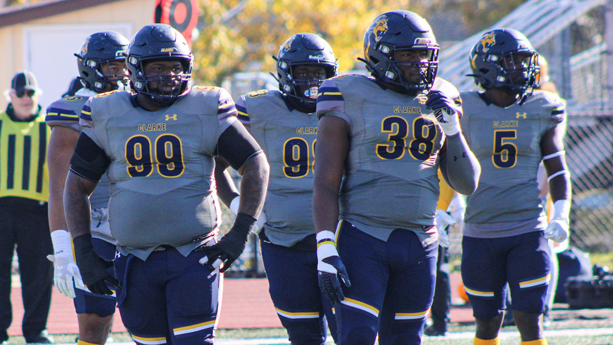 Clarke's defensive players getting set prior to a play