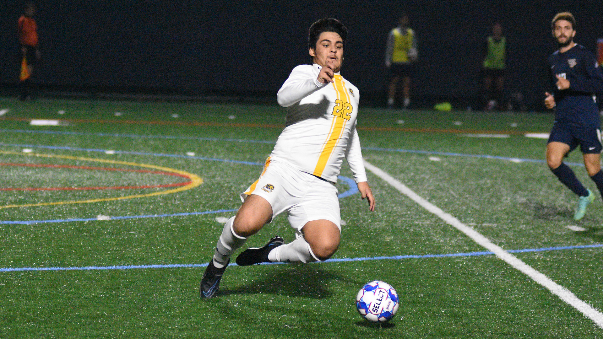 CU's Luis Alvarado beginning a sliding attempt at the ball