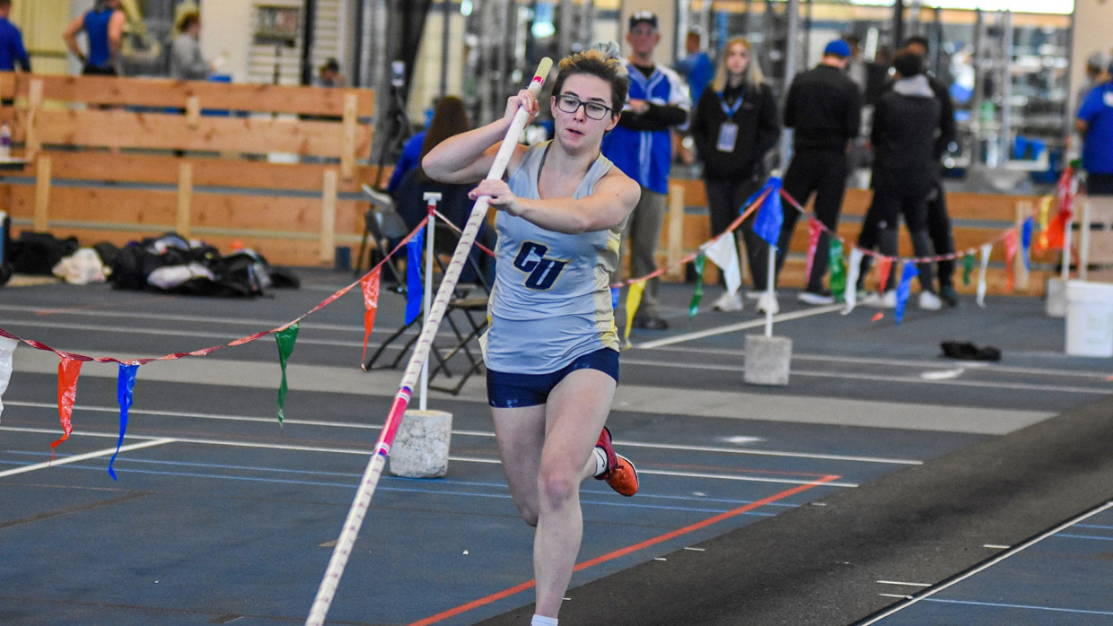 Clarke's Emma Grant making her approach run in the pole vault event